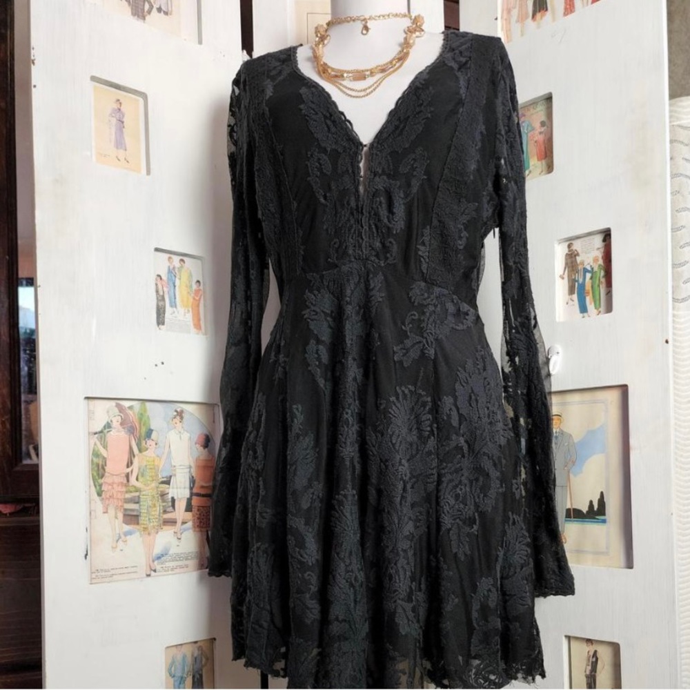 Free People black lace dress with bell sleeves